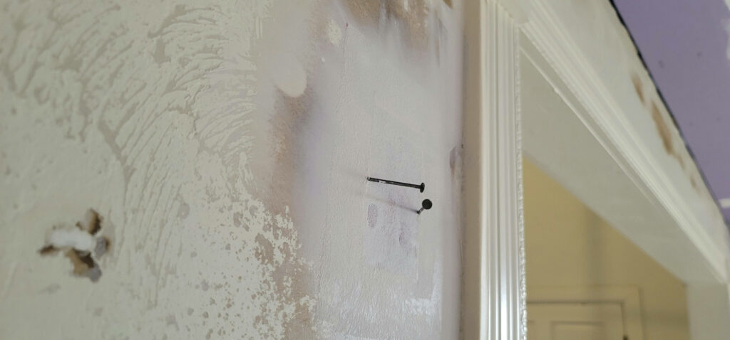 Visible wall defect recorded during a commercial building condition inspection